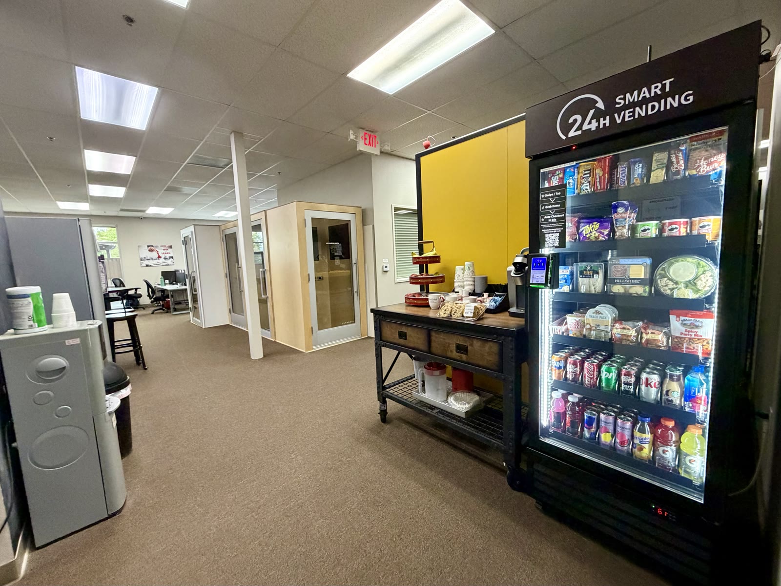 LevelUp installation in a yellow-wall coffee area, view 2